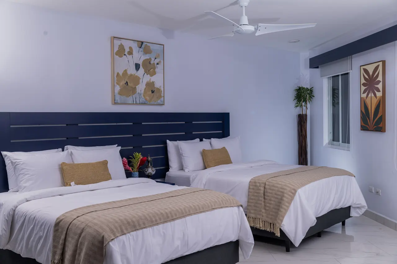 Two queen beds in the Pacific Suite