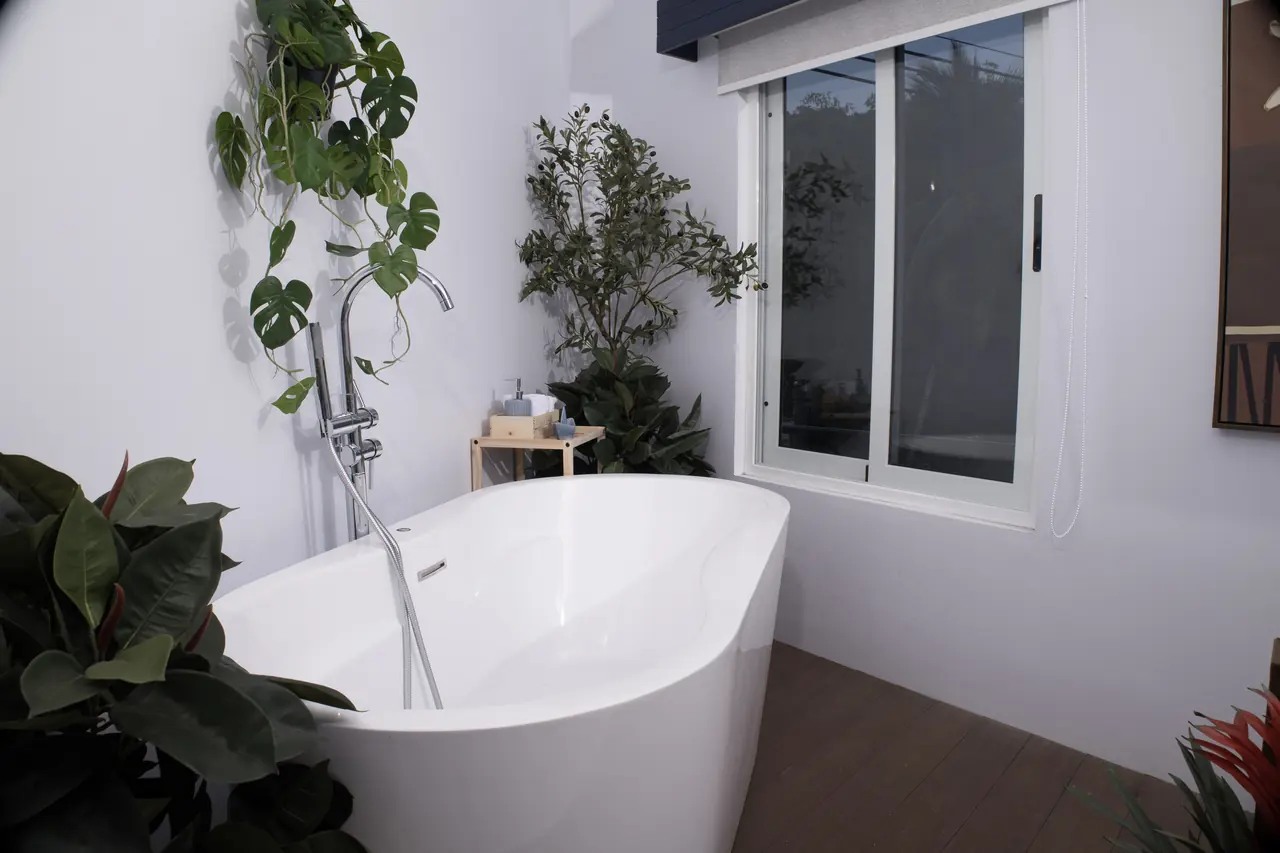 Freestanding bathtub by the window in the Serenity Suite